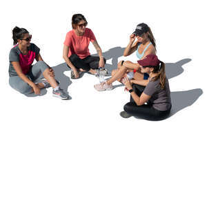 group of women sitting on the ground seen from top angle