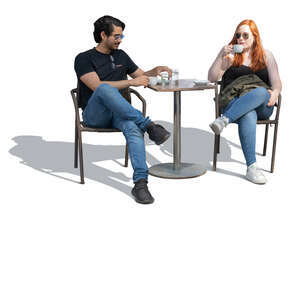 two people sitting outside in a cofeeshop