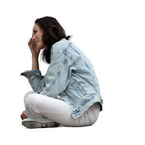 asian woman sitting on the ground