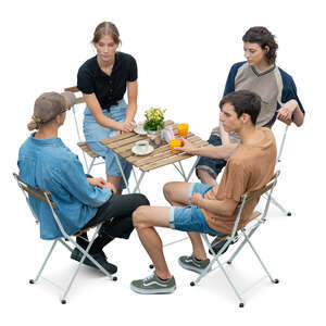 group of friends sitting in a restaurant seen from above