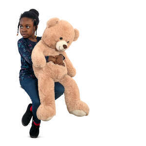 little black girl with a big teddy bear sitting