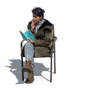 cut out woman sitting and smoking and reading a book