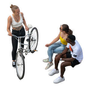 top view of a woman with a bike talking to two friends