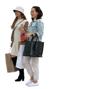 two asian women standing in front of a shop window and talking