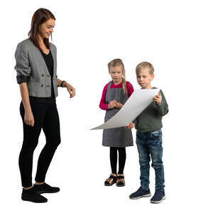 little boy showing his drawing to his teacher