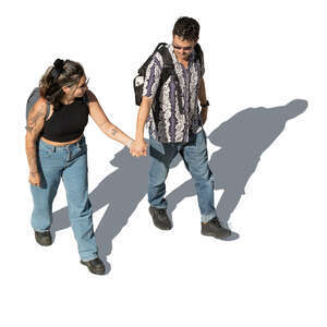 cut out couple walking hand in hand seen from above