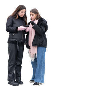 two women looking at a phone together