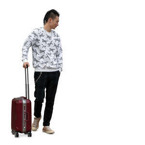 cut out asian man with a suitcase walking and looking at smth