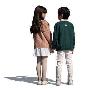 two asian kids standing hand in hand