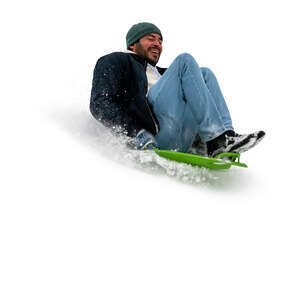 cut out man sledding down the hill