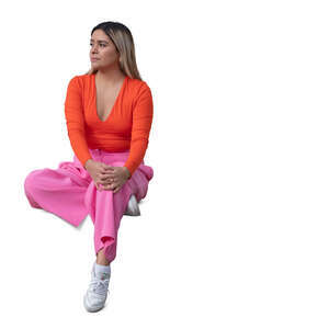 cut out woman in pink outfit sitting