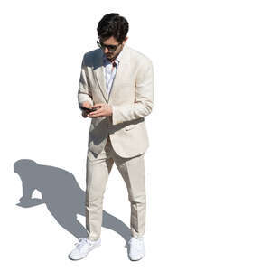 man in a white suit standing seen from above