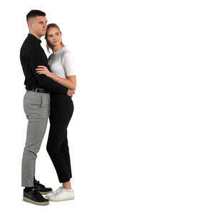 couple standing and with arms around each other