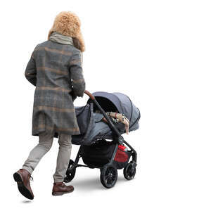 man with a baby stroller walking