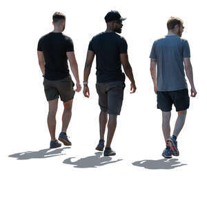 group of backlit men walking