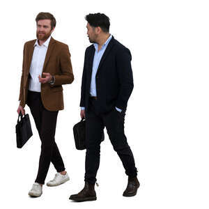 two smart casual men walking and talking