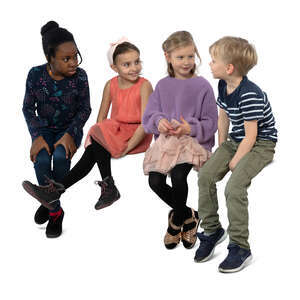 group of children sitting and talking