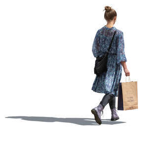 woman in a blue dress walking