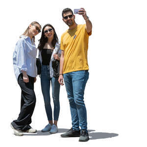 group of friends taking a selfie outside