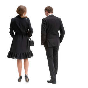 man and woman in formal party clothes walking