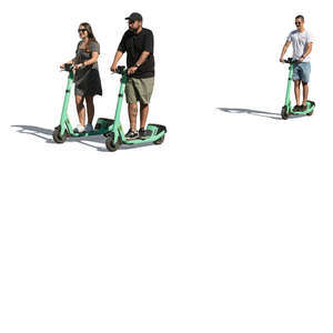 group of three people riding on electric scooters