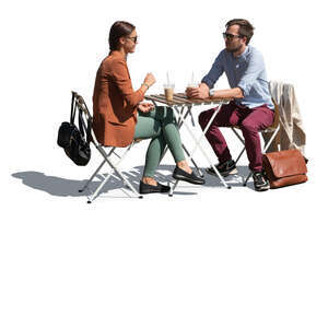 man and woman sitting in a casual outdoor coffeeshop