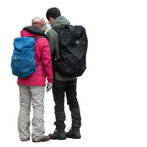 man and woman standing and looking at a city map