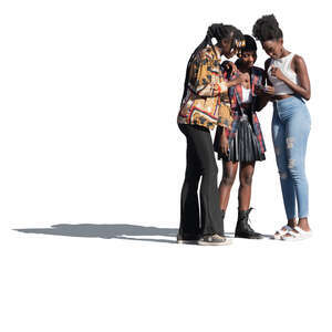 three black women standing and looking at a phone