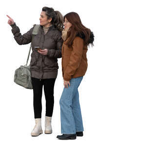 two women in autumn standing and pointing at smth