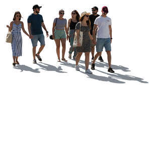 large backlit group of people walking