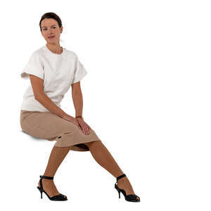 woman in a beige skirt sitting