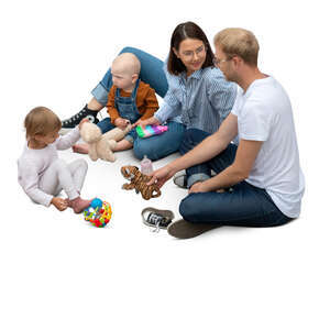 family with small kids playing on the floor