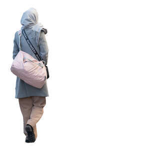 woman with a headscarf walking