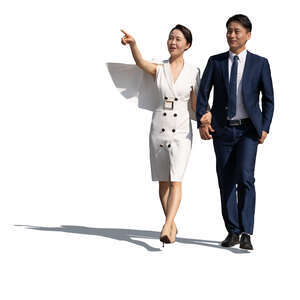 asian man and woman walking hand in hand