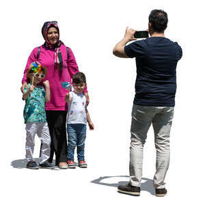 muslim man taking a picture of his family