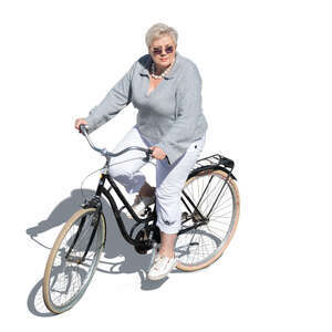 older woman ridin a bike seen from above