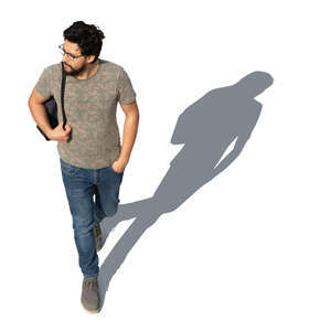 dark haired man walking seen from above