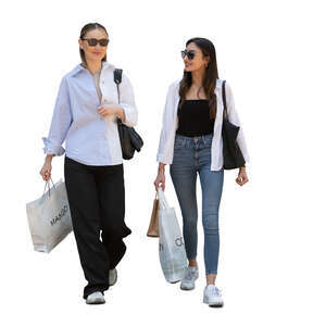 two women with shopping bags walking