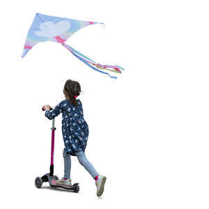 little girl with a kite riding a scooter