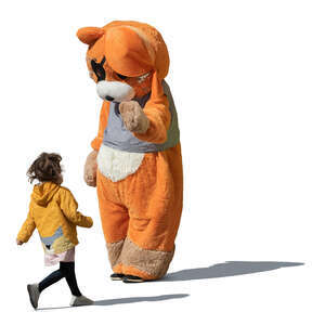 kid running towards a giant orange animal