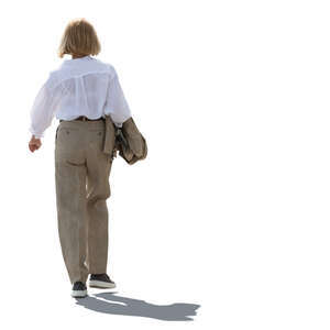 backlit woman walking