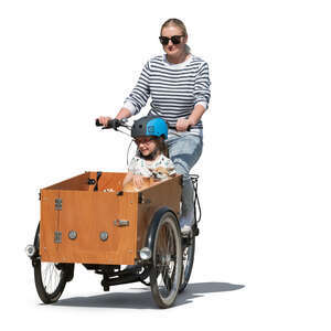 woman riding a cargo bike with her daughter and dog sitting in the box