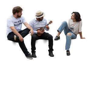 group of hispanic friens sitting and playing banjo