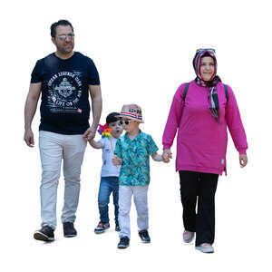 middle eastern family with two kids walking hand in hand