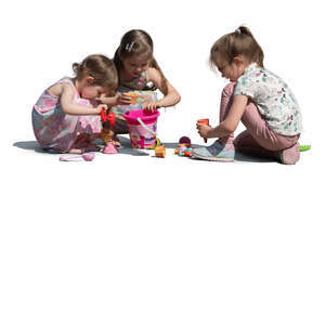 group of girls playing in the sandbox