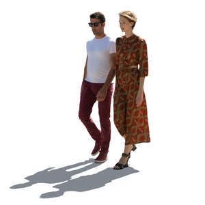 backlit man and woman walking