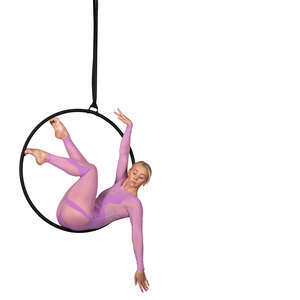 female acrobat performing on an aerial hoop