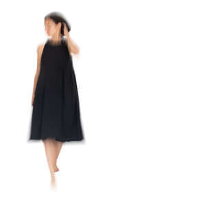 motion blur image of a woman walking down the stairs