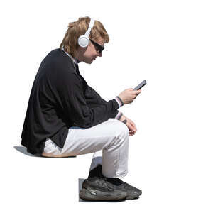 man with headphones sitting