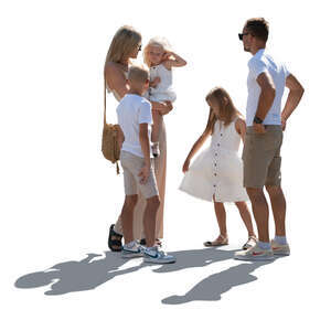 backlit family with children standing in summer